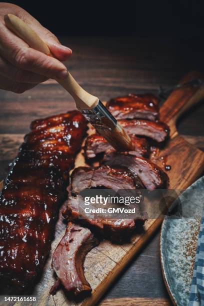 grilled bbq pork spareribs - barbeque sauce stock pictures, royalty-free photos & images