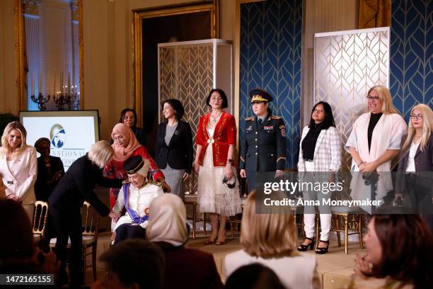Recipients of the 17th annual International Women of Courage Award Ceremony arrive in the East Room of the White House on March 08, 2023 in...