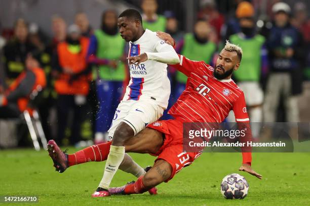 Nuno Mendes of Paris Saint-Germain is tackled by Eric Maxim Choupo-Moting of FC Bayern Munich during the UEFA Champions League round of 16 leg two...