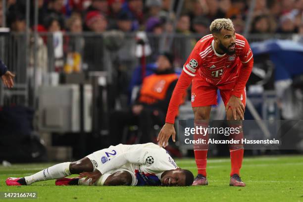 Nuno Mendes of Paris Saint-Germain reacts after being is tackled by Eric Maxim Choupo-Moting of FC Bayern Munich during the UEFA Champions League...