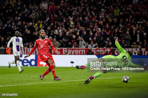 Eric Maxim Choupo-Moting of Munich scores his team's first goal against Gianluigi Donnarumma of Paris during the UEFA Champions League round of 16...