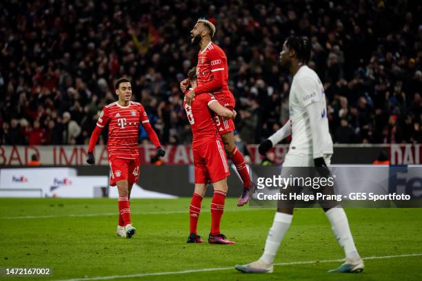 Eric Maxim Choupo-Moting of Munich celebrates with Leon Goretzka and Jamal Musiala of Munich after scoring his team's first goal during the UEFA...