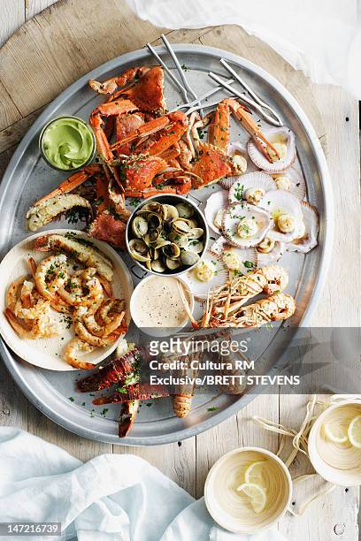 tray of seafood with dipping sauces - aioli bildbanksfoton och bilder