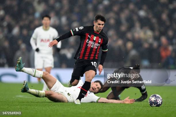 Brahim Diaz of AC Milan runs with the ball after evading Ben Davies of Tottenham Hotspur during the UEFA Champions League round of 16 leg two match...