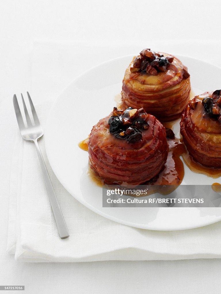 Plate of baked apples with fruit