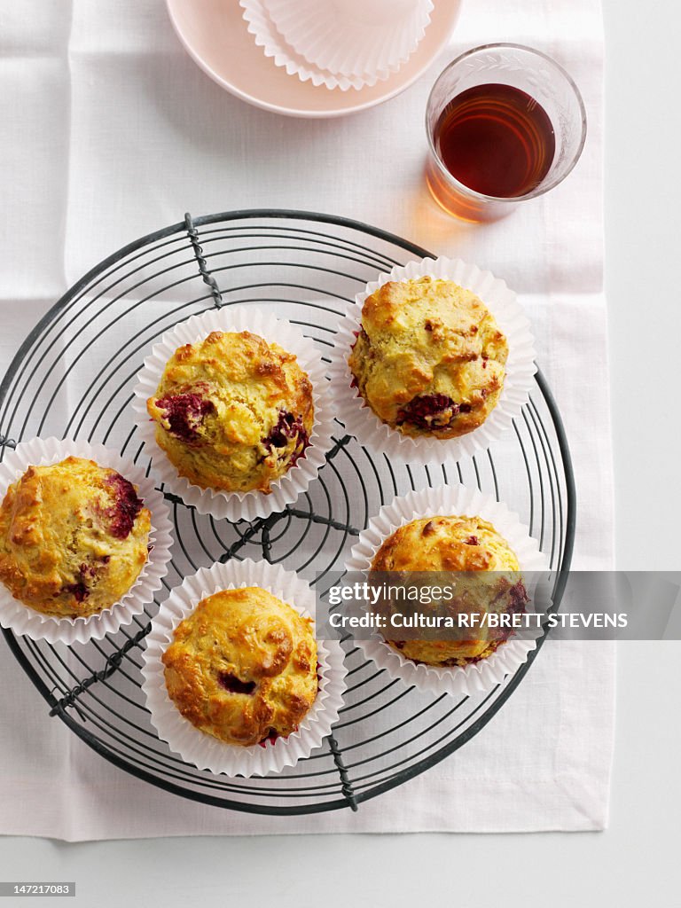 Fruit muffins on cooling rack