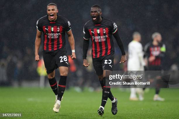 Malick Thiaw and Fikayo Tomori of AC Milan celebrates victory after the UEFA Champions League round of 16 leg two match between Tottenham Hotspur and...