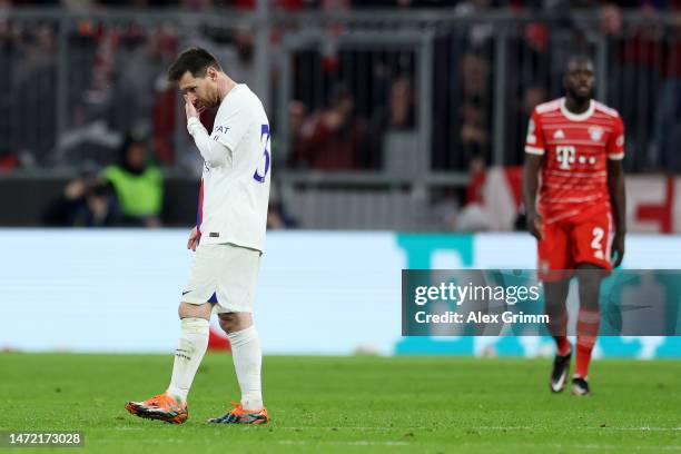 Lionel Messi of Paris Saint-Germain looks dejected after Serge Gnabry of FC Bayern Munich scores the team's second goal during the UEFA Champions...