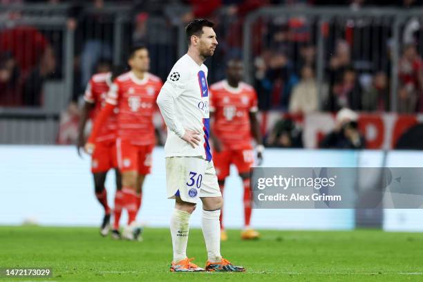 Lionel Messi of Paris Saint-Germain looks dejected after Serge Gnabry of FC Bayern Munich scores the team's second goal during the UEFA Champions...