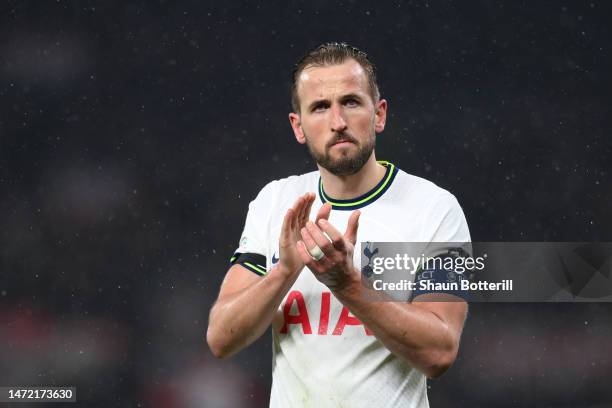 Harry Kane of Tottenham Hotspur applauds the fans after the teams defeat during UEFA Champions League round of 16 leg two match between Tottenham...