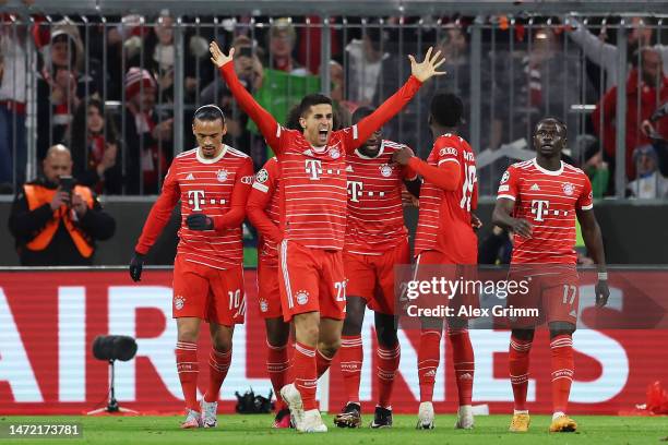 Joao Cancelo of FC Bayern Munich celebrates with teammates after Serge Gnabry scores the team's second goal during the UEFA Champions League round of...