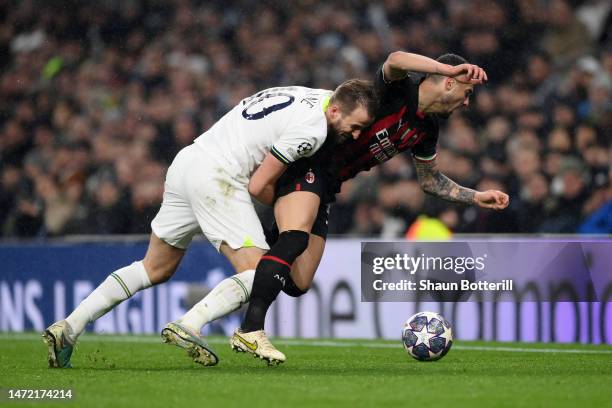 Harry Kane of Tottenham Hotspur challenges Rade Krunic of AC Milan during the UEFA Champions League round of 16 leg two match between Tottenham...