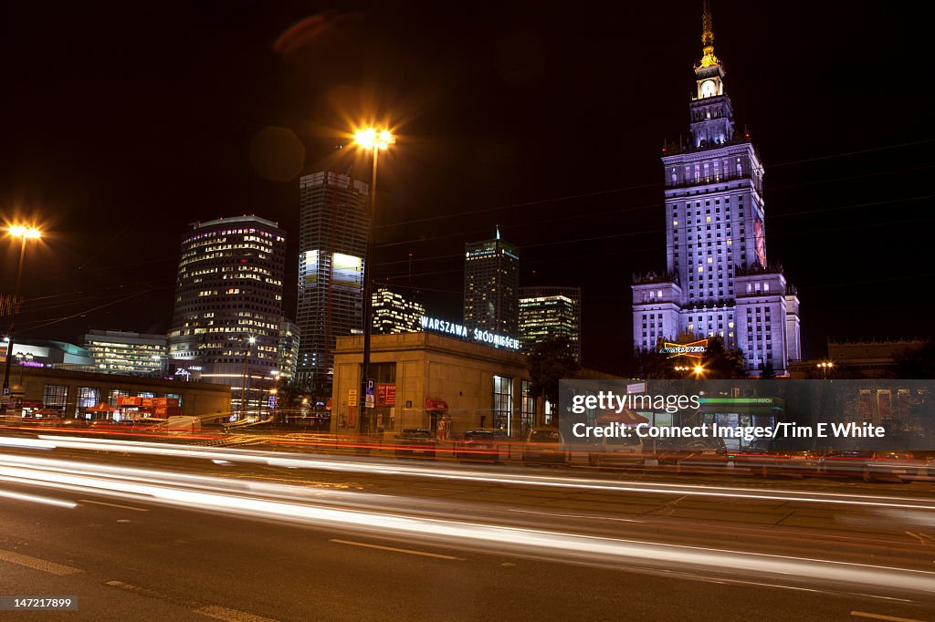 Blurred view of traffic in city at night