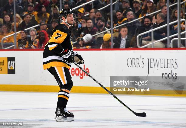 Dmitry Kulikov of the Pittsburgh Penguins skates against the Columbus Blue Jackets at PPG PAINTS Arena on March 7, 2023 in Pittsburgh, Pennsylvania.