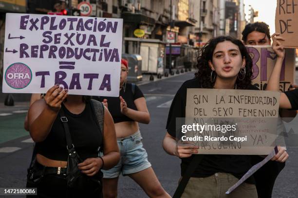 Women of the Abolitionist movement hold signs with slogans during a demonstration called to commemorate International Women's Day on March 8 in...