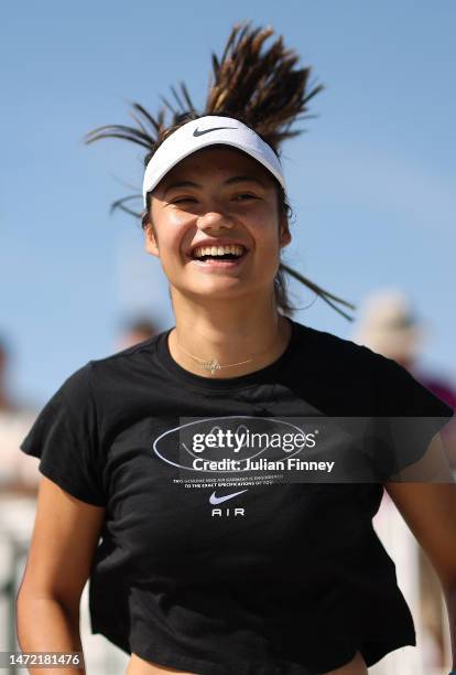 Emma Raducanu of Great Britain meets fans after a practice session during the BNP Paribas Open on March 08, 2023 in Indian Wells, California.