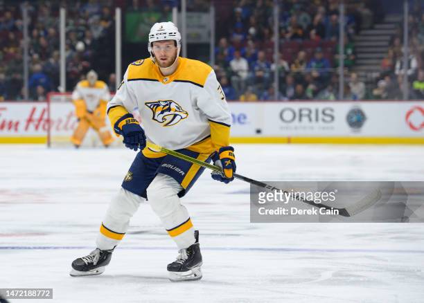 Jeremy Lauzon of the Nashville Predators skates up ice during the second period of their NHL game against the Vancouver Canucks at Rogers Arena on...