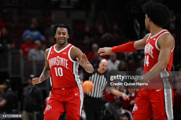 Brice Sensabaugh of the Ohio State Buckeyes reacts in the first half after scoring against the Wisconsin Badgers during the first round of the Big...