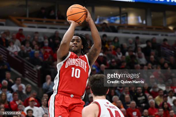 Brice Sensabaugh of the Ohio State Buckeyes shoots in the second half against the Wisconsin Badgers during the first round of the Big Ten tournament...