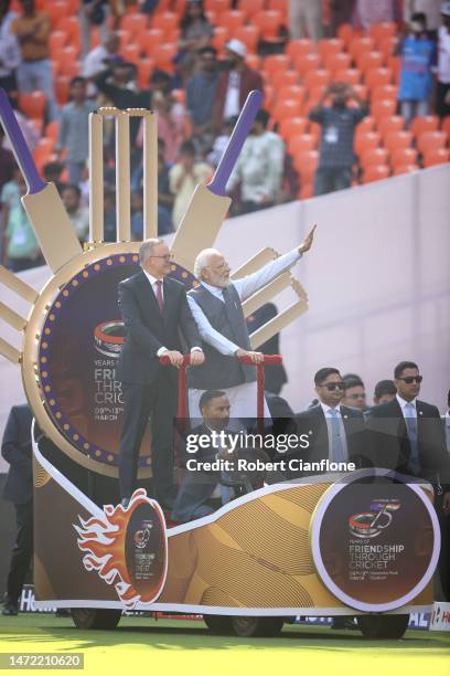 Australian Prime Minister Anthony Albanese and Indian Prime Minister Narendra Modi are seen on a lap of honour during day one of the Fourth Test...