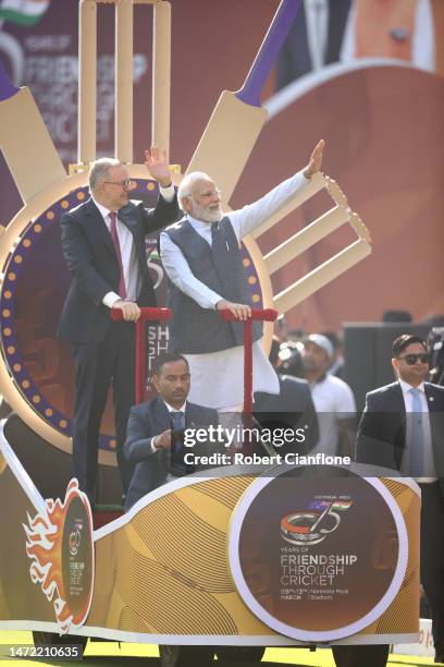 Australian Prime Minister Anthony Albanese and Indian Prime Minister Narendra Modi are seen on a lap of honour during day one of the Fourth Test...