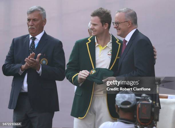 Australian Prime Minister Anthony Albanese greets Australian captain Steve Smith during day one of the Fourth Test match in the series between India...