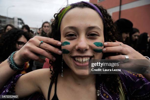 People from Fridays for Future and feminist girls of 'Non Una di Meno' take part in a protest during the International Women's Day March on March 8,...