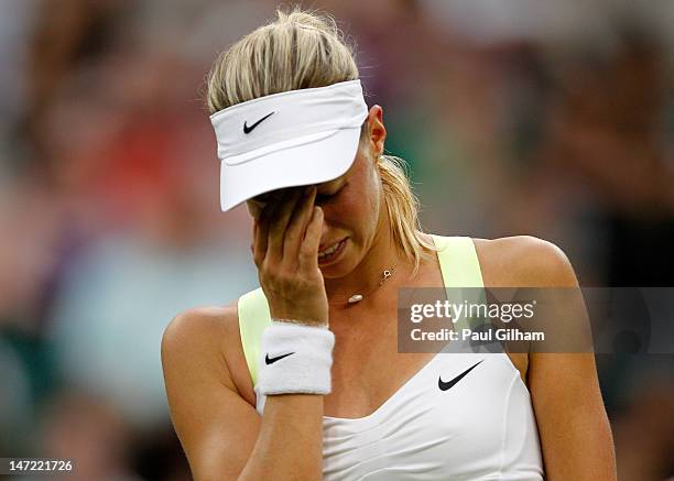 Andrea Hlavackova of Czech Republic shows her dejection during her Ladies' singles second round match against Kim Clijsters of Belgium on day three...