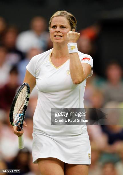 Kim Clijsters of Belgium celebrates match point during her Ladies' singles second round match against Andrea Hlavackova of Czech Republic on day...