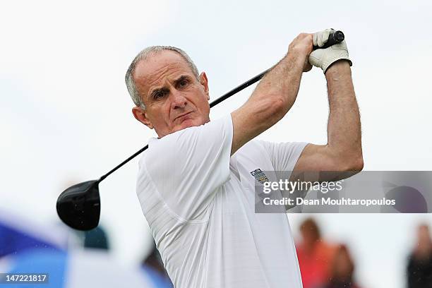 Senator, Martin McAleese hits his tee shot on the 1st hole during the Pro Am for the 2012 Irish Open held on the Dunluce Links at Royal Portrush Golf...