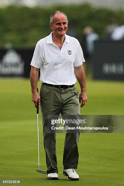 Senator, Martin McAleese walks on the 18th hole during the Pro Am for the 2012 Irish Open held on the Dunluce Links at Royal Portrush Golf Club on...
