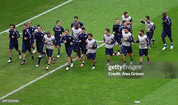 Players of Italy take part in a training session ahead of their UEFA EURO 2012 semi-final match against Germany, at National Stadium on June 27, 2012...