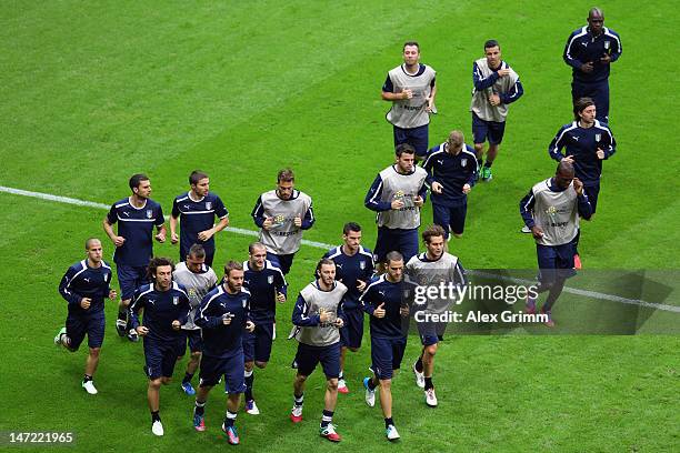 Players of Italy take part in a training session ahead of their UEFA EURO 2012 semi-final match against Germany, at National Stadium on June 27, 2012...