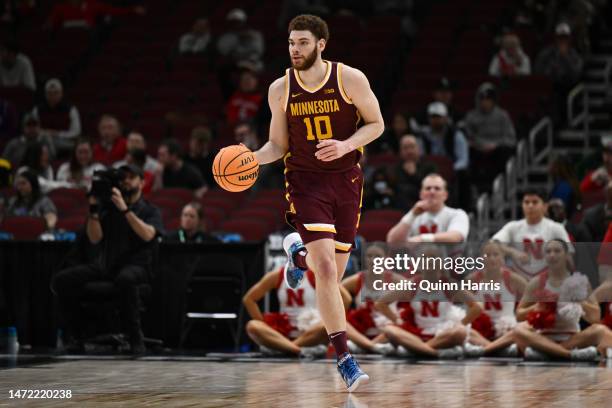 Jamison Battle of the Minnesota Golden Gophers handles the basketball in the second half against the Nebraska Cornhuskers during the first round of...