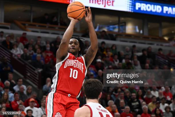 Brice Sensabaugh of the Ohio State Buckeyes shoots in the second half against the Wisconsin Badgers during the first round of the Big Ten tournament...