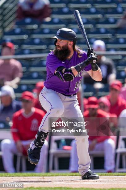 Charlie Blackmon of the Colorado Rockies bats in the first inning against the Los Angeles Angels during a Spring Training game at Tempe Diablo...