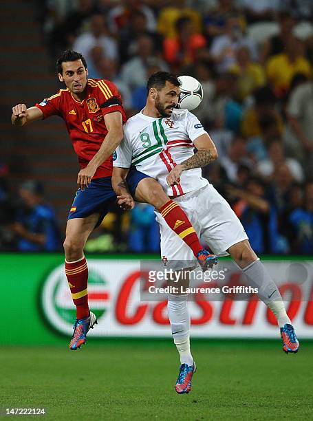 Alvaro Arbeloa of Spain challenges Hugo Almeida of Portugal during the UEFA EURO 2012 semi final match between Portugal and Spain at Donbass Arena on...