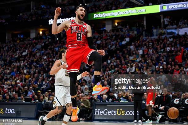Zach LaVine of the Chicago Bulls jumps and slams the ball for two points in the second half of a game against the Denver Nuggets at Ball Arena on...
