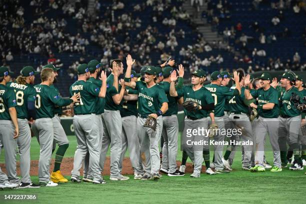 Australia players celebrate the team's 8-7 victory in the World Baseball Classic Pool B game between Australia and Korea at Tokyo Dome on March 9,...