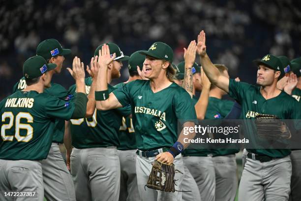 Australia players celebrate the team's 8-7 victory in the World Baseball Classic Pool B game between Australia and Korea at Tokyo Dome on March 9,...