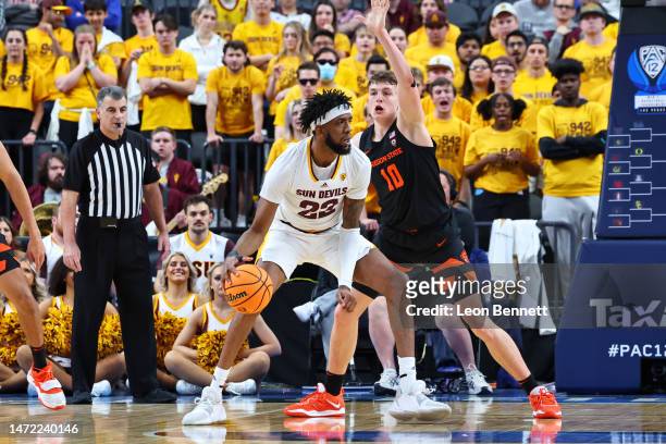 Warren Washington of the Arizona State Sun Devils handles the ball against Tyler Bilodeau of the Oregon State Beavers in the second half of a...