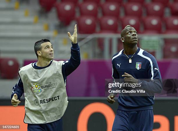 Antonio Di Natale and Mario Balotelli during an Italy training session ahead of their UEFA EURO 2012 semi-final match against Germany at National...