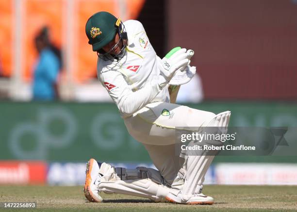 Usman Khawaja of Australia avoids a delivery from Mohammed Shami of India during day one of the Fourth Test match in the series between India and...