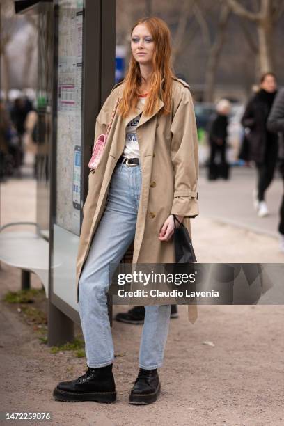 Sara Grace Wallerstedt wears, a beige Burberry trench coat, jeans and black boots outside Chanel, during Paris Fashion Week - Womenswear Fall Winter...