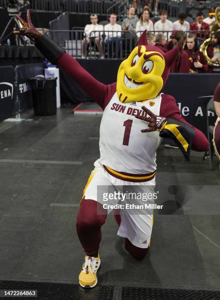 The Arizona State Sun Devils mascot Sparky the Sun Devil poses before the team's first-round game of the Pac-12 basketball tournament against the...