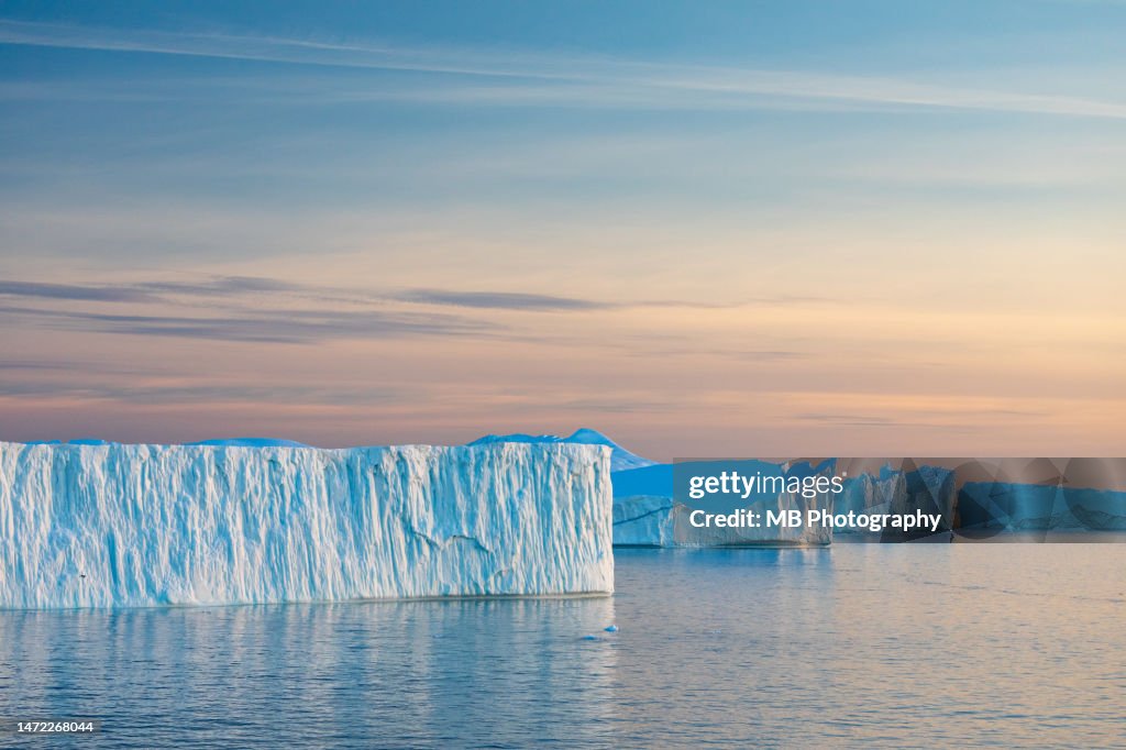 Tabular Icebergs at Sunset in Disko Bay