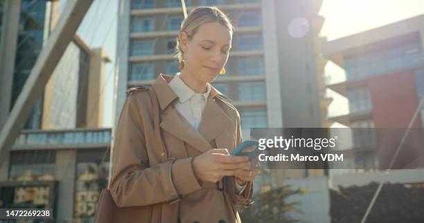 woman, travel and phone outdoor in city while online for internet search, booking or chat. business person with smartphone on mobile app with 5g network connection on website with urban buildings - google ventures stock pictures, royalty-free photos & images