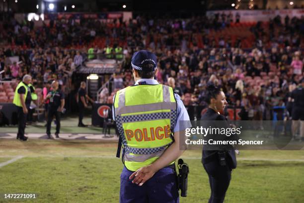 Police officer is seen in front of the crowd following the round two NRL match between the Penrith Panthers and the South Sydney Rabbitohs at BlueBet...