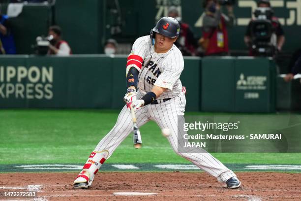Munetaka Murakami of Japan strikes out in the third inning during the World Baseball Classic Pool B game between China and Japan at Tokyo Dome on...