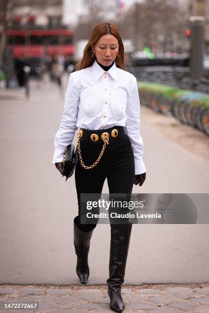 Guest wearing a Schiaparelli look, is seen outside Chanel, during Paris Fashion Week - Womenswear Fall Winter 2023 2024, on March 07, 2023 in Paris,...